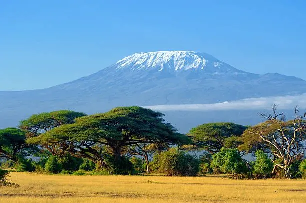 Snow-capped Mount Kilimanjaro rising above the Tanzanian plains